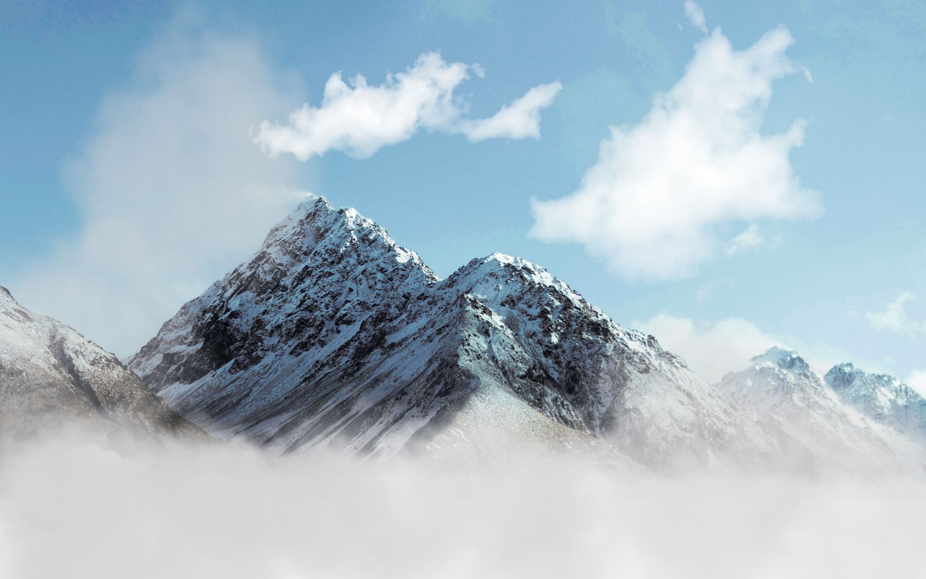 majestic snow capped mountain peaks in winter